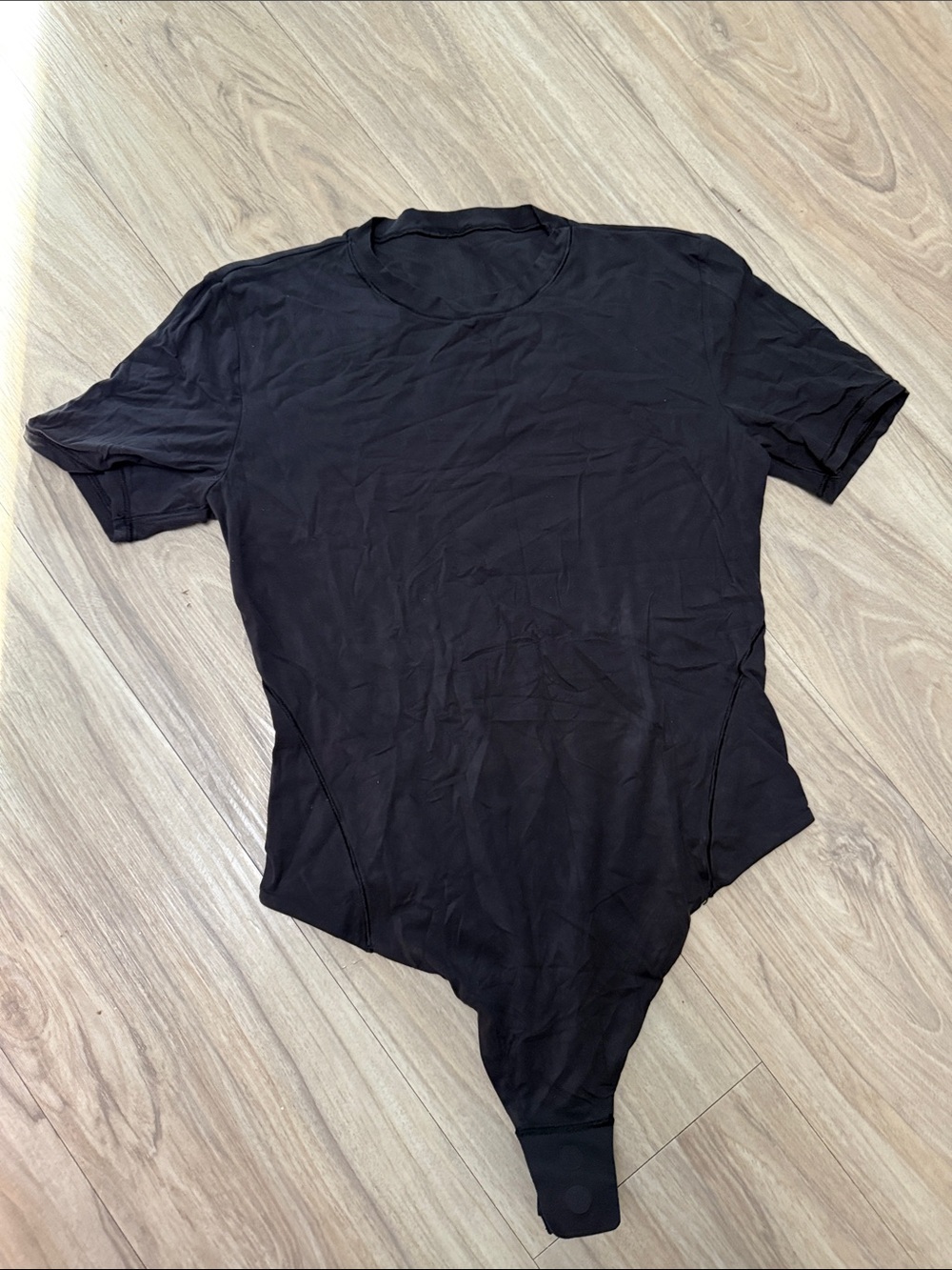 Lululemon Nulu Black Short Sleeve Thong Bodysuit (size M)